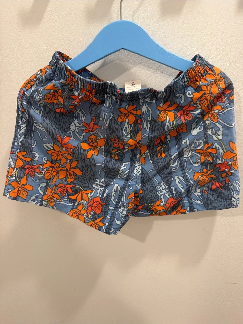 Patagonia Kids Blue Swim Trunks with Orange Floral Print